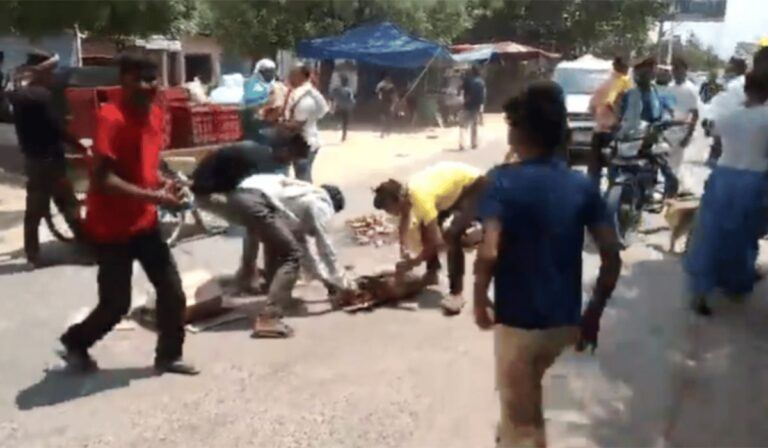 People Loot Liquor Bottles