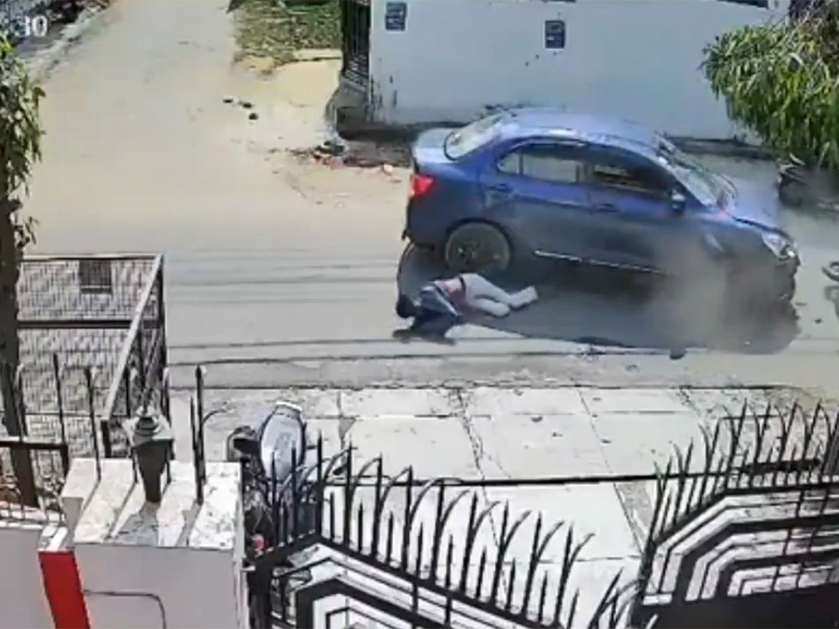 Lucknow bike crash, Indira Nagar accident, CCTV road accident, speeding bike collision, Lucknow traffic mishap