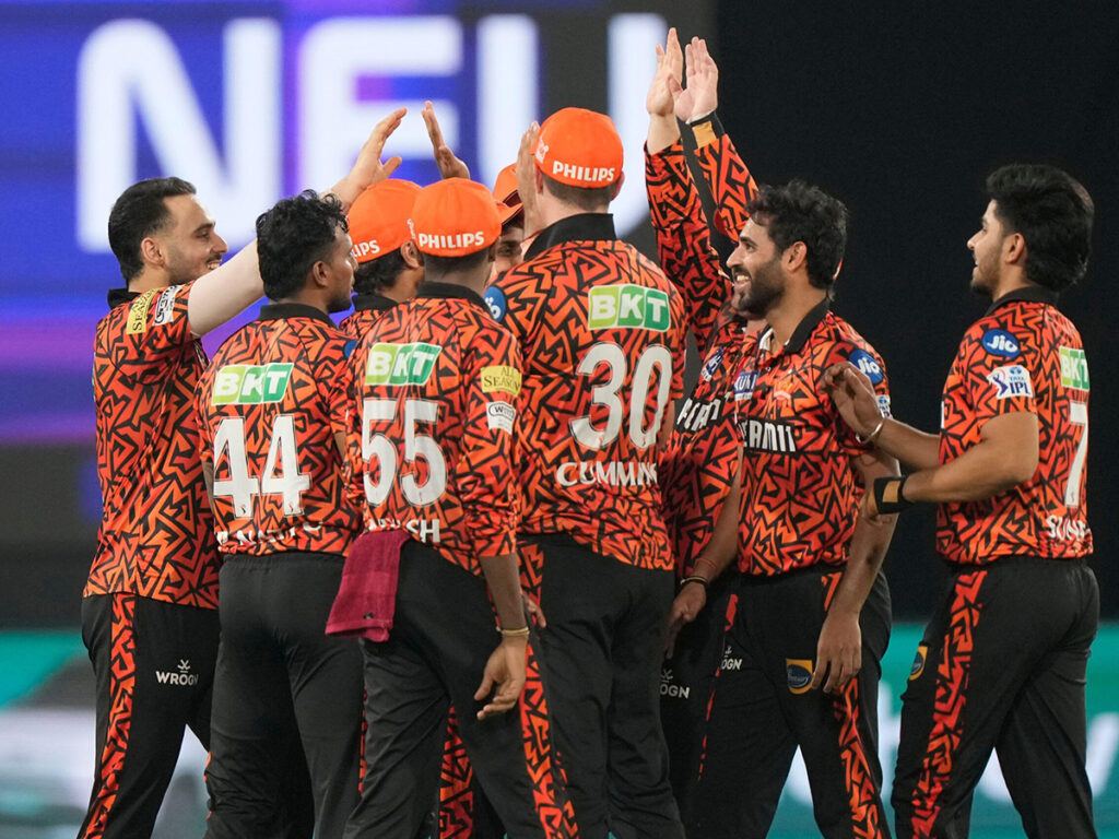 Sunrisers Hyderabad's Bhuvneshwar Kumar, second from right, celebrates the wicket of Lucknow Super Giants' Quinton de Kock with teammates during the Indian Premier League cricket match between Sunrisers Hyderabad and Lucknow Super Giants in Hyderabad, Ind