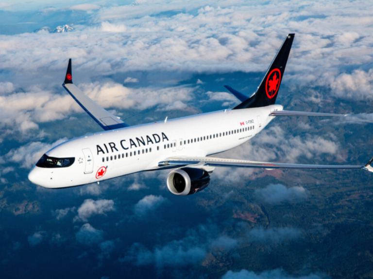 Air Canada aircraft parked at airport gate