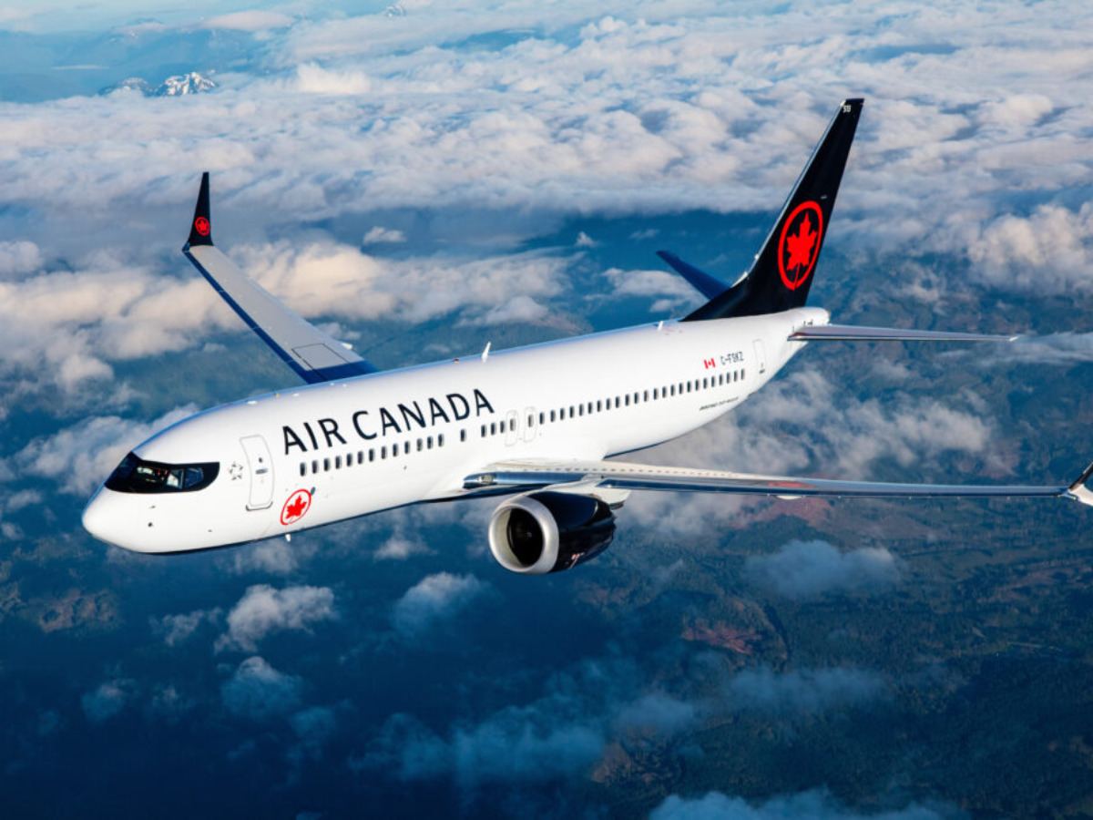 Air Canada aircraft parked at airport gate