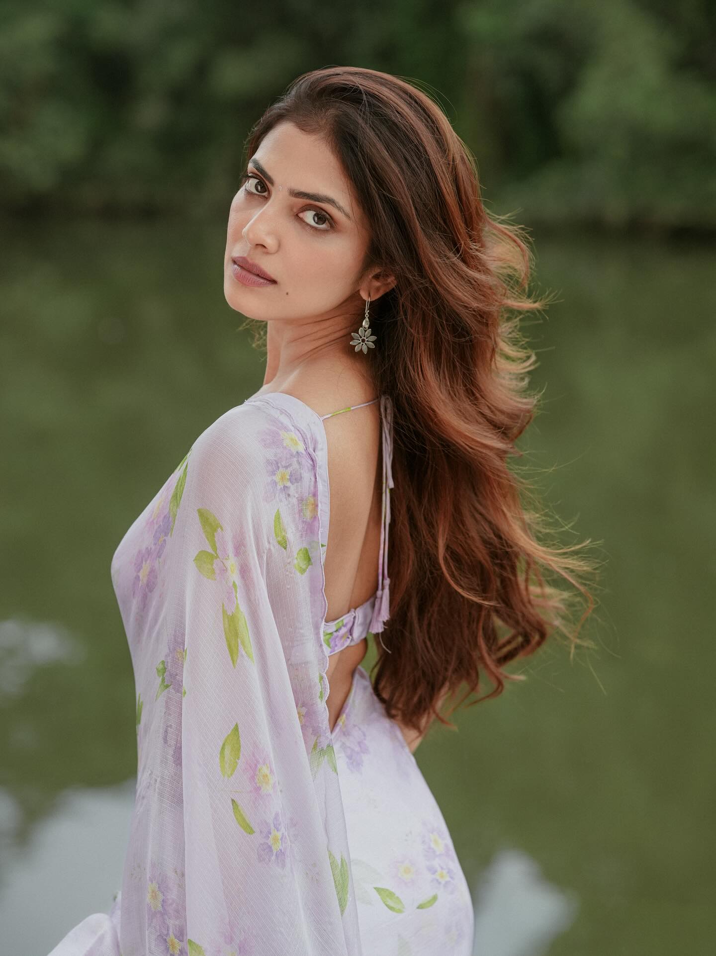 Malavika Mohanan hot saree vibes stun with elegance, charm, and glamour in this stylish gallery of traditional fashion.