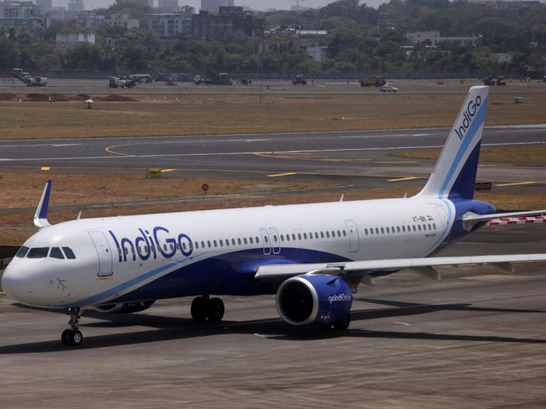 IndiGo aircraft at airport terminal