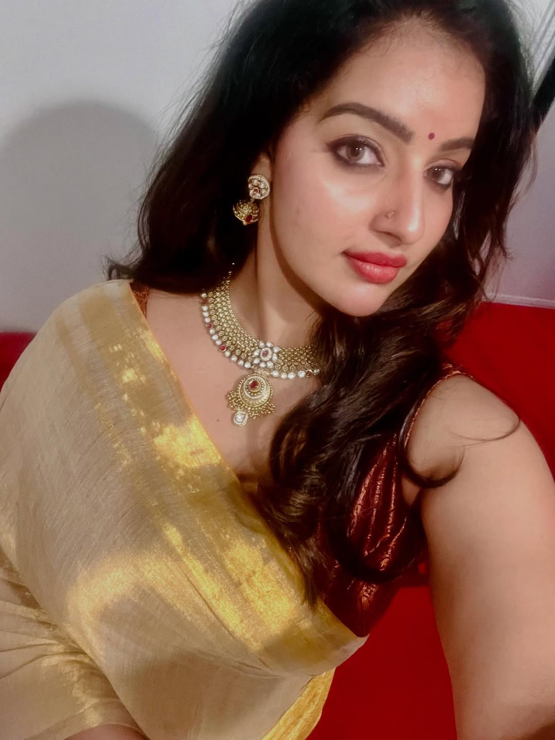 Elegant beauty captured in Malavika Menon Serving a Hot Face Card moment.