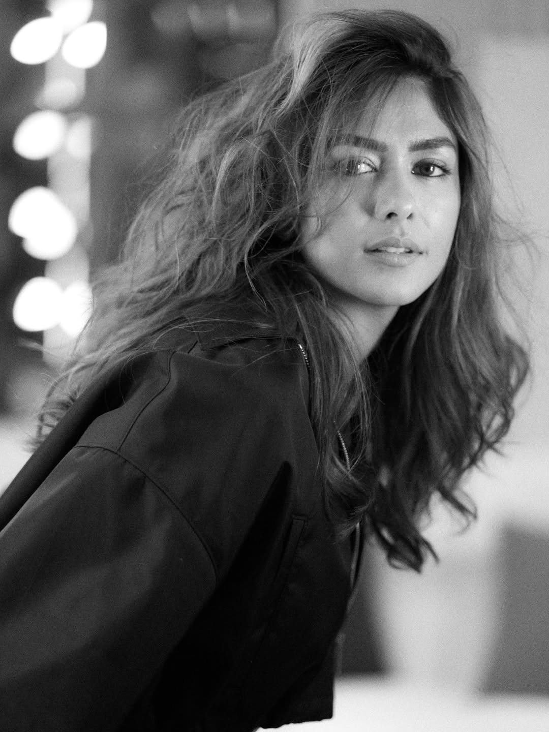 Stunning Mrunal Thakur exudes charm and grace in bold black fashion.