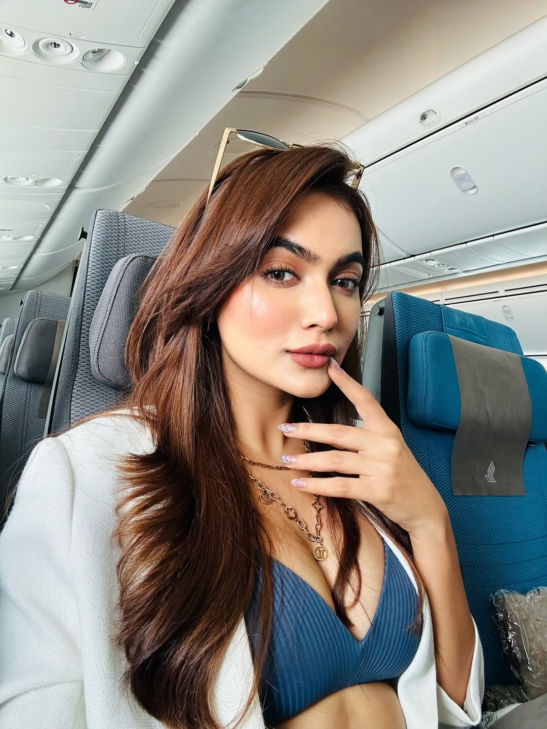 Radiant charm captured in Flying High on Hotness: Reva Kaurase portrait.
