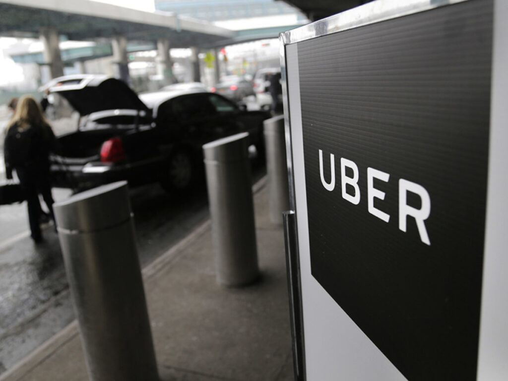 Uber car outside airport terminal