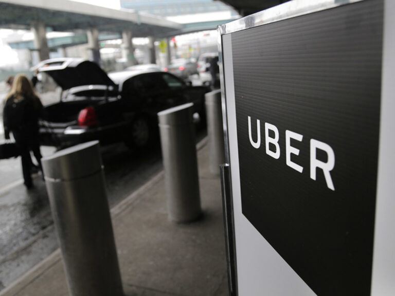 Uber car outside airport terminal