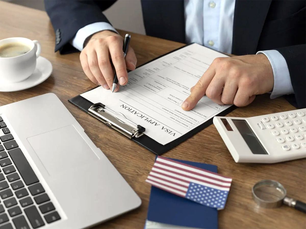 USCIS officer checking applicant signature