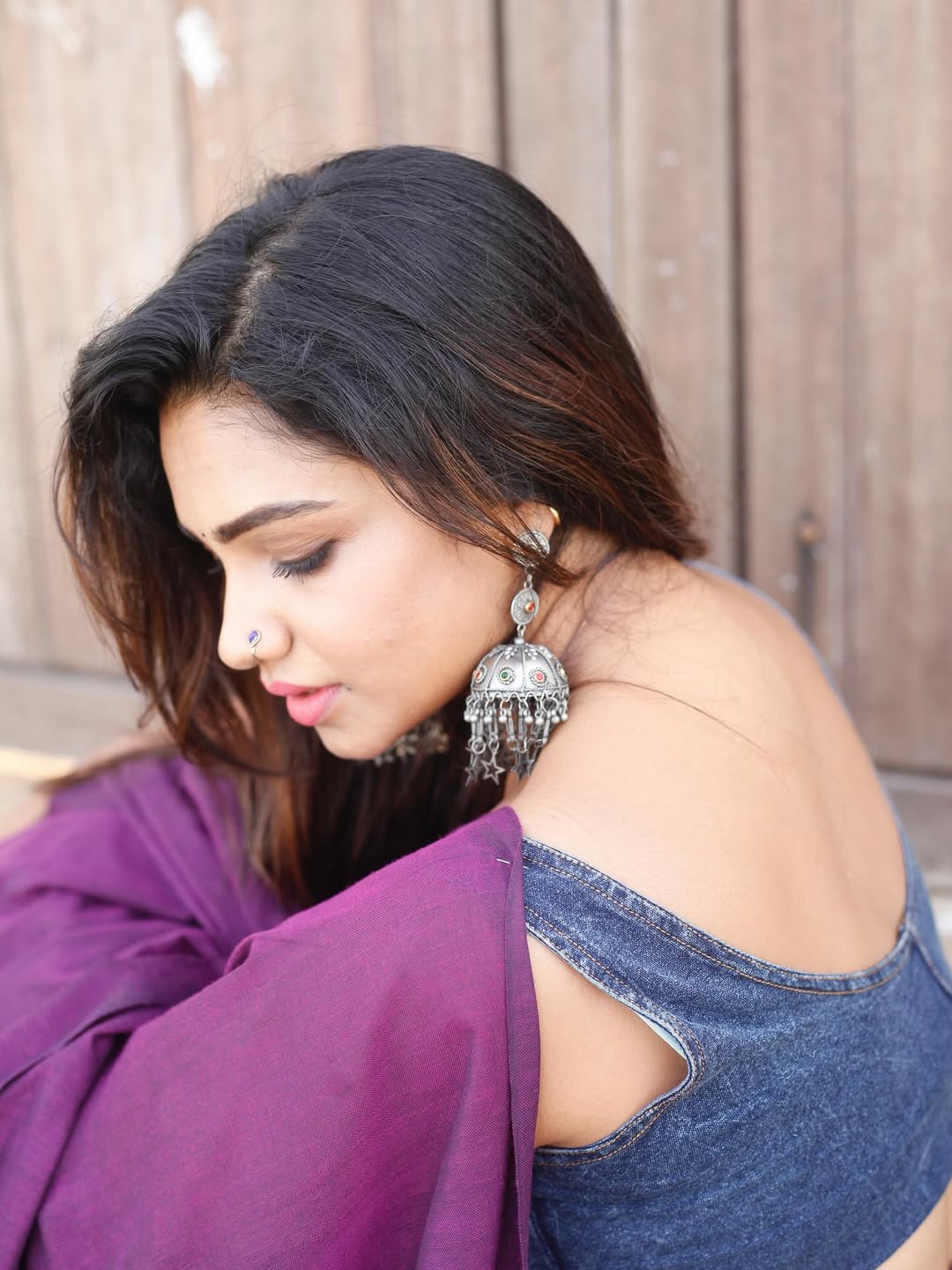 Stylish Vaishnavi Naaiyak Saree paired with denim blouse exudes chic vibes.