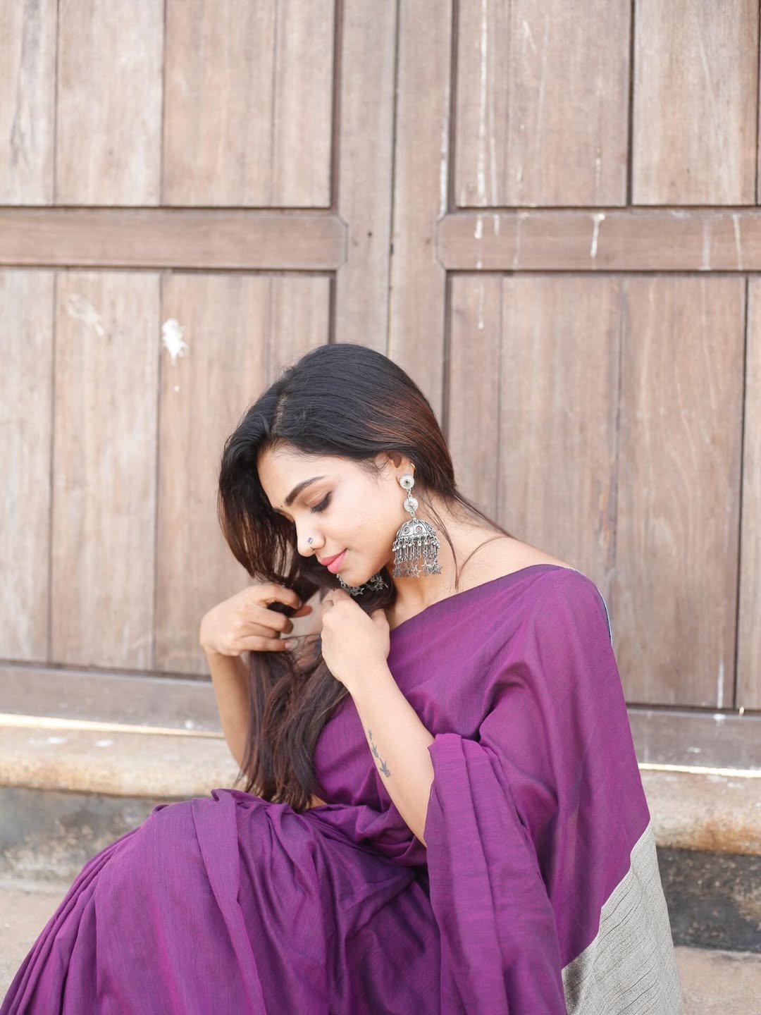 Chic statement with Vaishnavi Naaiyak Saree paired with denim blouse.