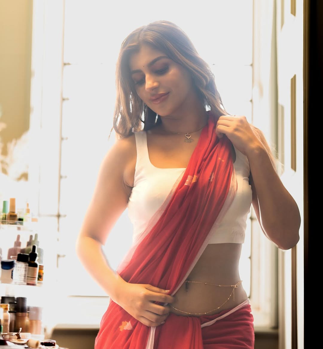 Confident Yashika Aannand glows with beauty in chic tattoo presentation.