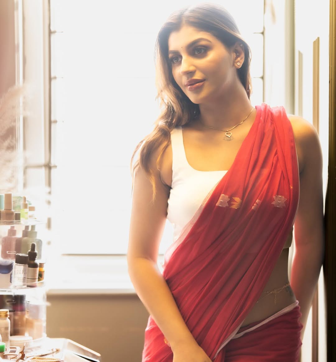 Yashika Aannand highlights her tattoos with radiant beauty and modern flair.