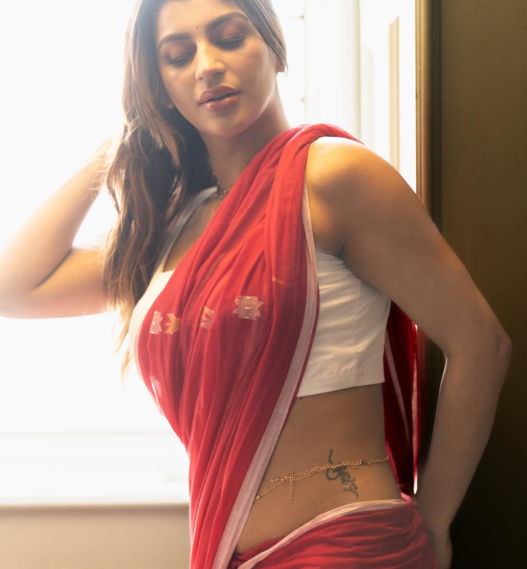 Yashika Aannand flaunts bold tattoo style with striking fashion elegance.