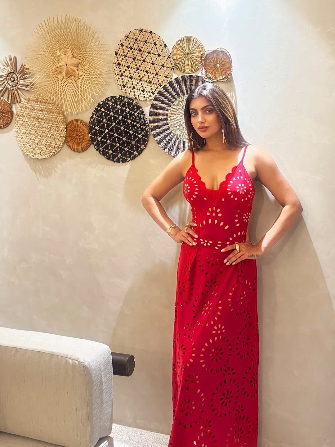 Akanksha Puri's Confident Stance In A Red Gown