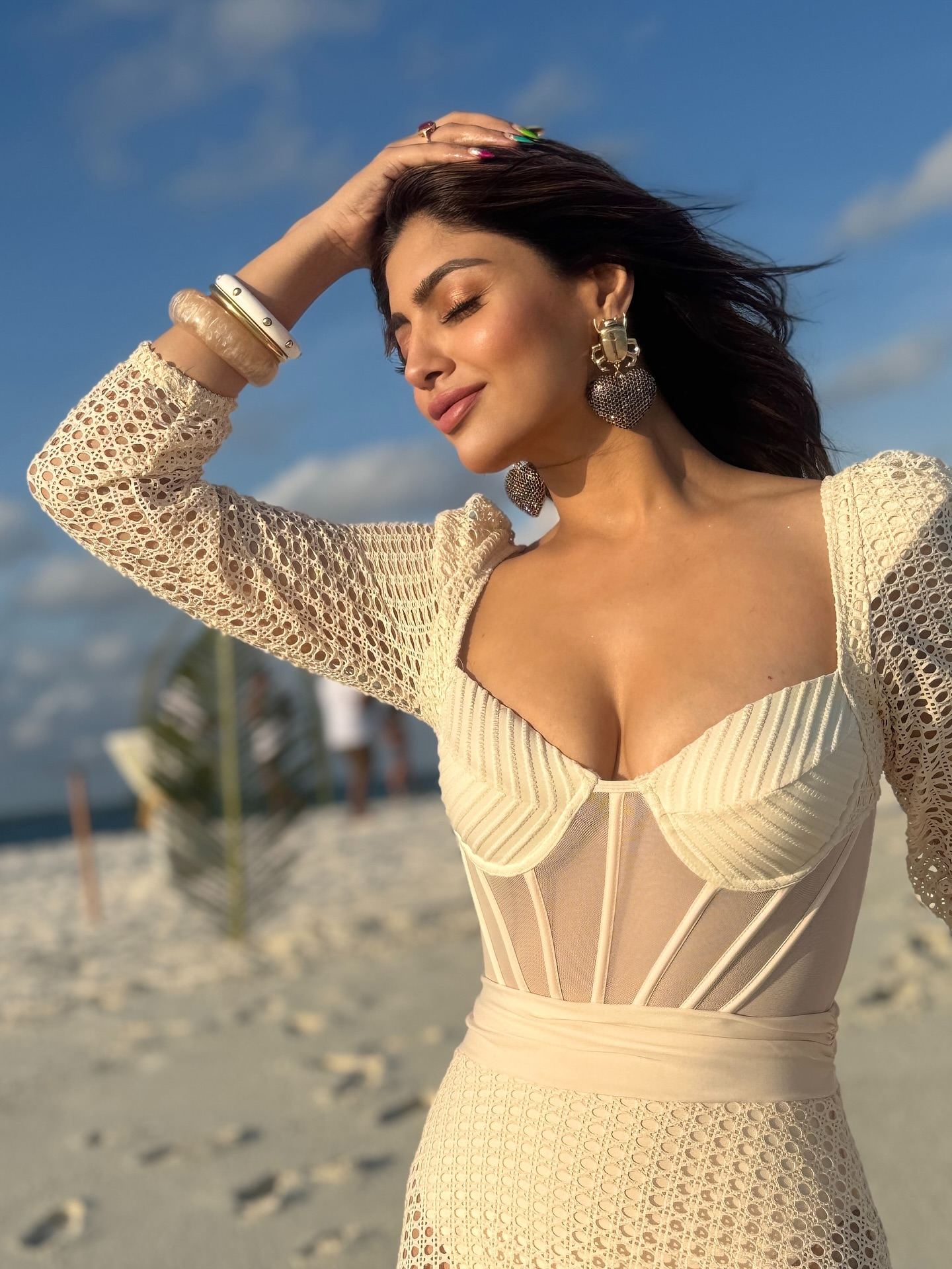 Akanksha Puri embraces the sea breeze in a gorgeous crochet dress.