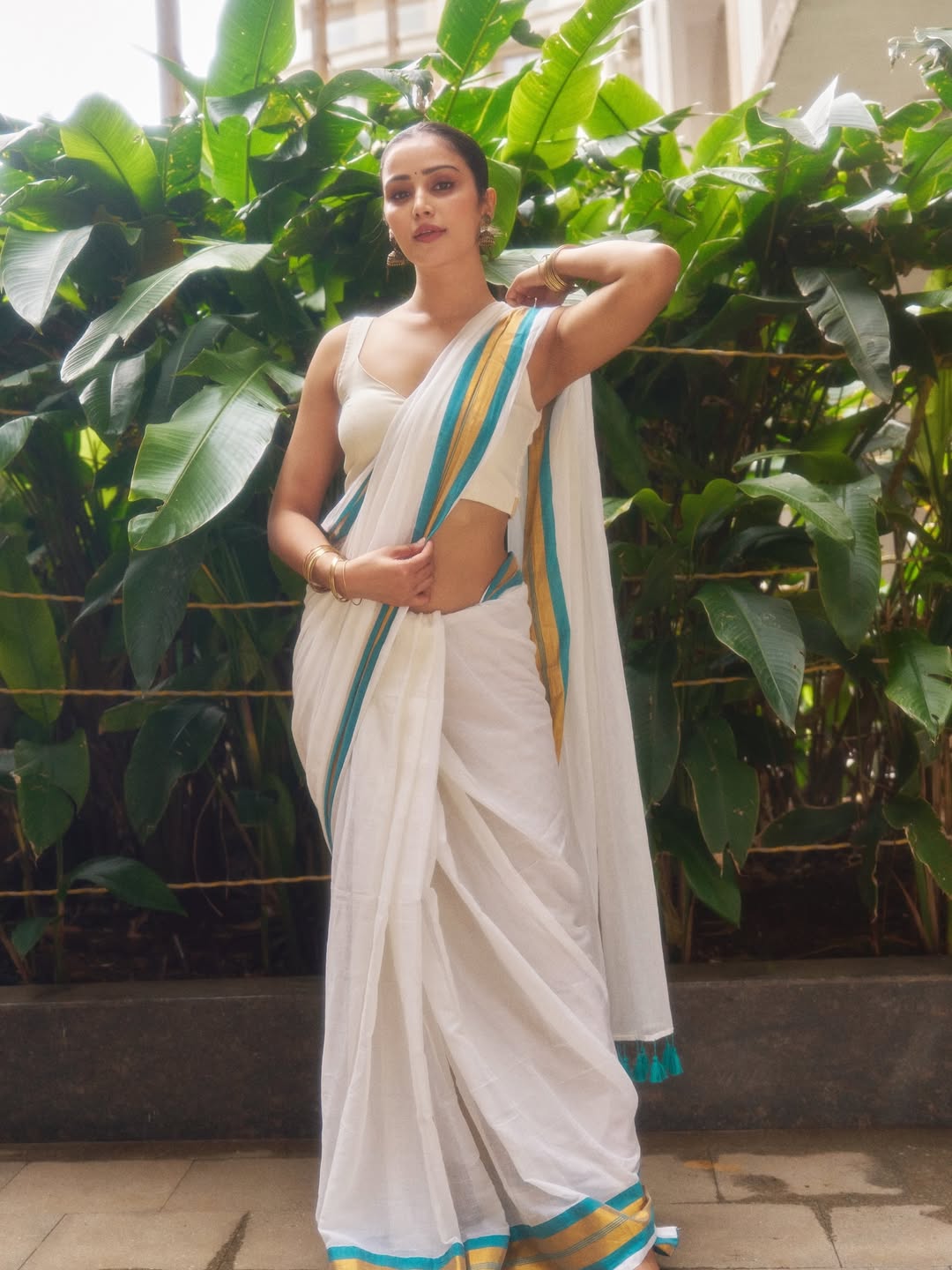 Elegant Anaira Gupta looks graceful in white red hot fashion.