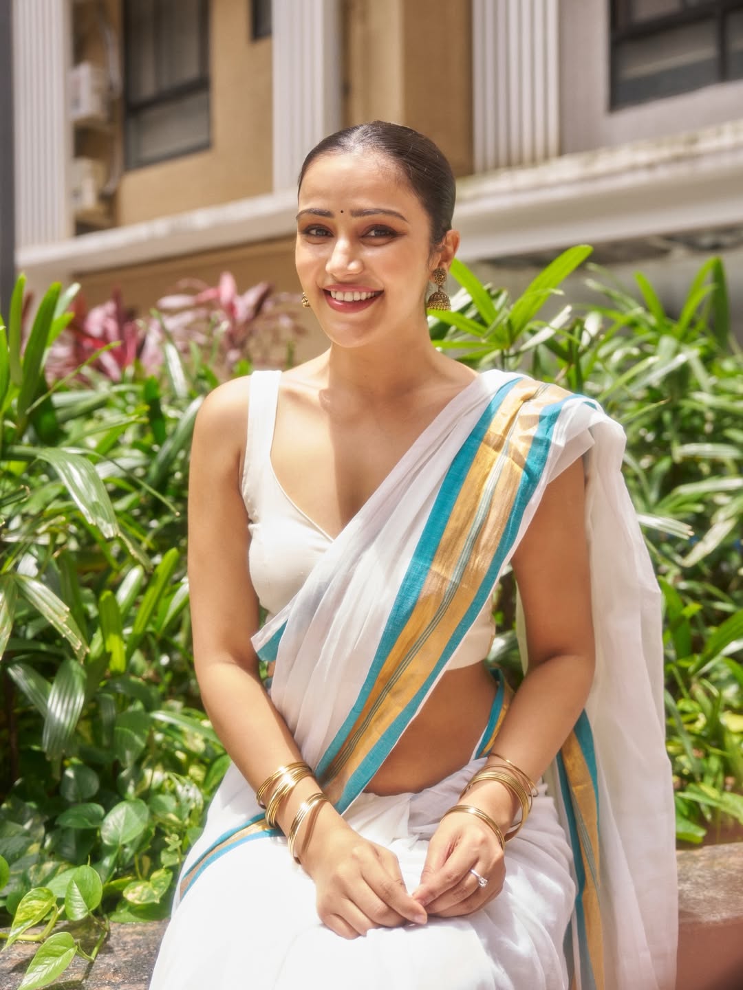 Captivating Anaira Gupta dazzles with white outfit and elegance.