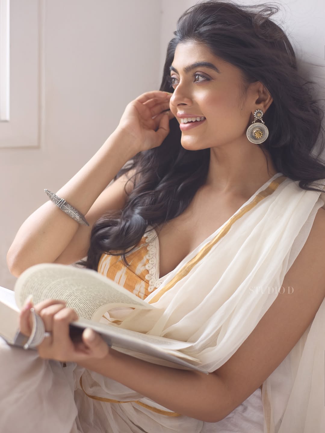 Ananya Das White Saree exudes elegance in serene setting