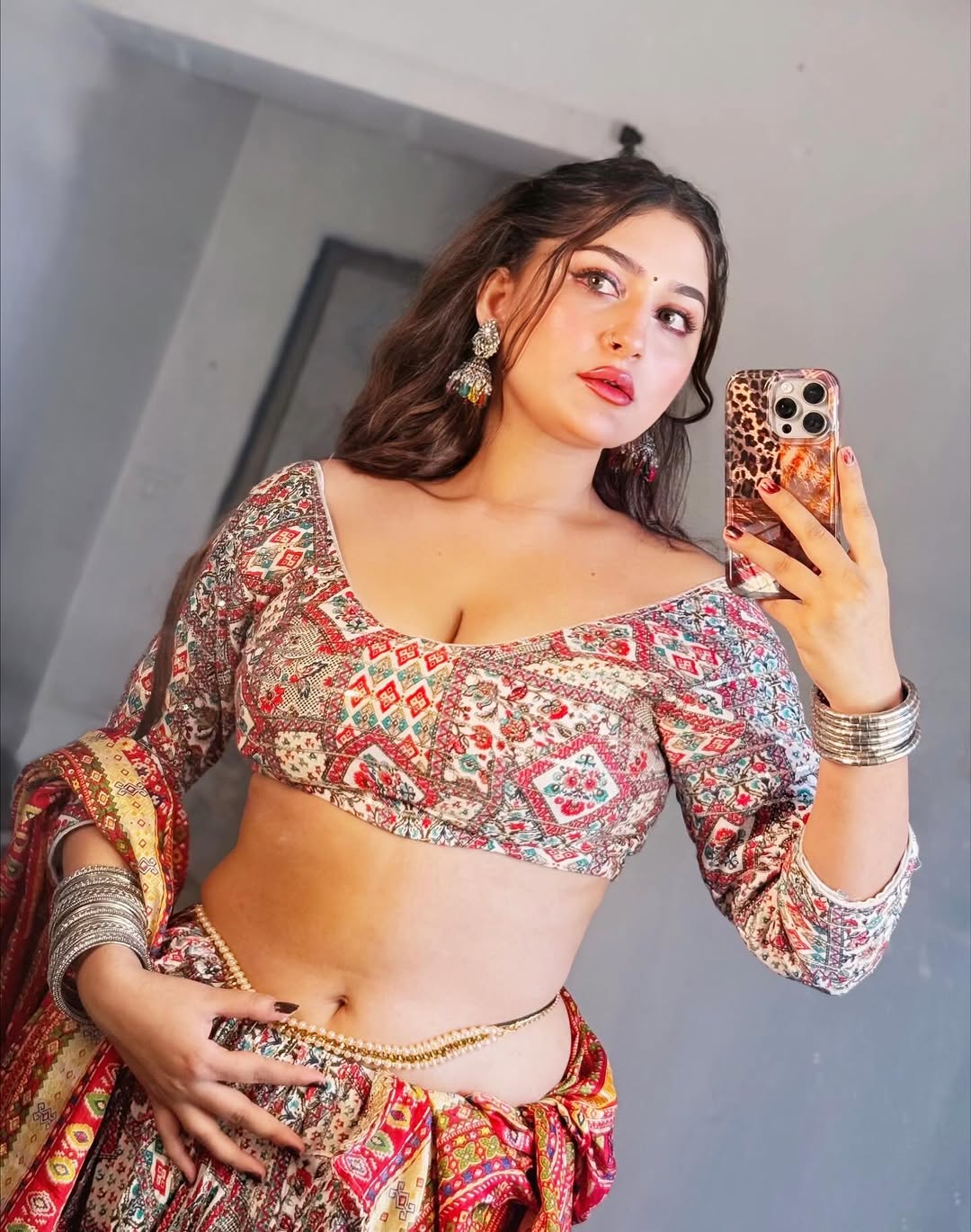 Anjita Takes A Mirror Selfie In A Printed Blouse
