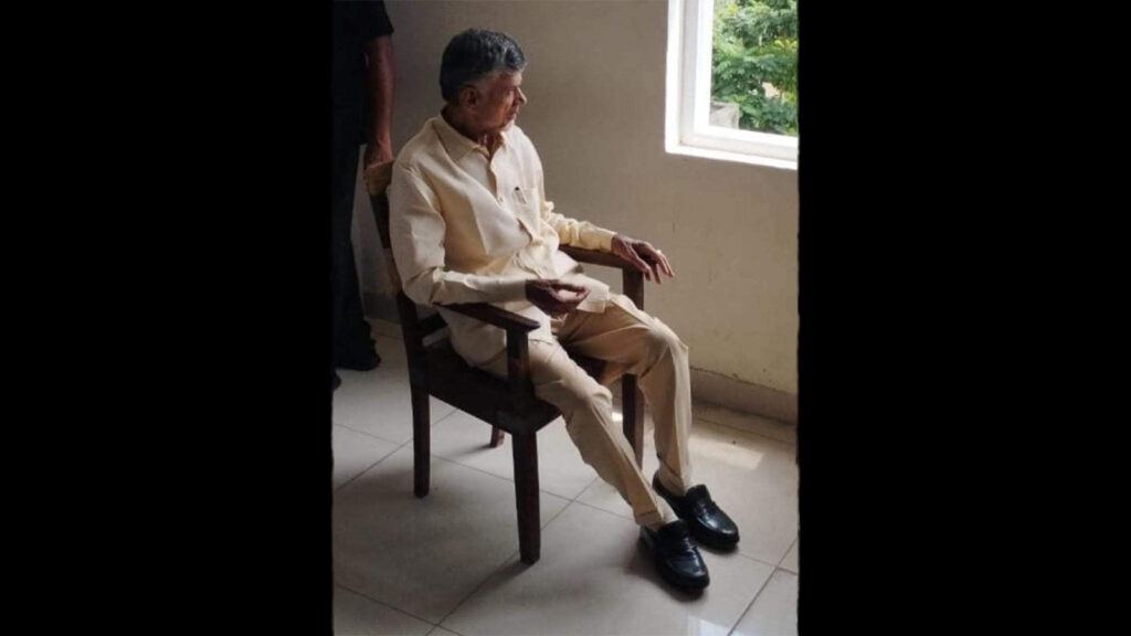 Chandrababu Naidu looks out court window