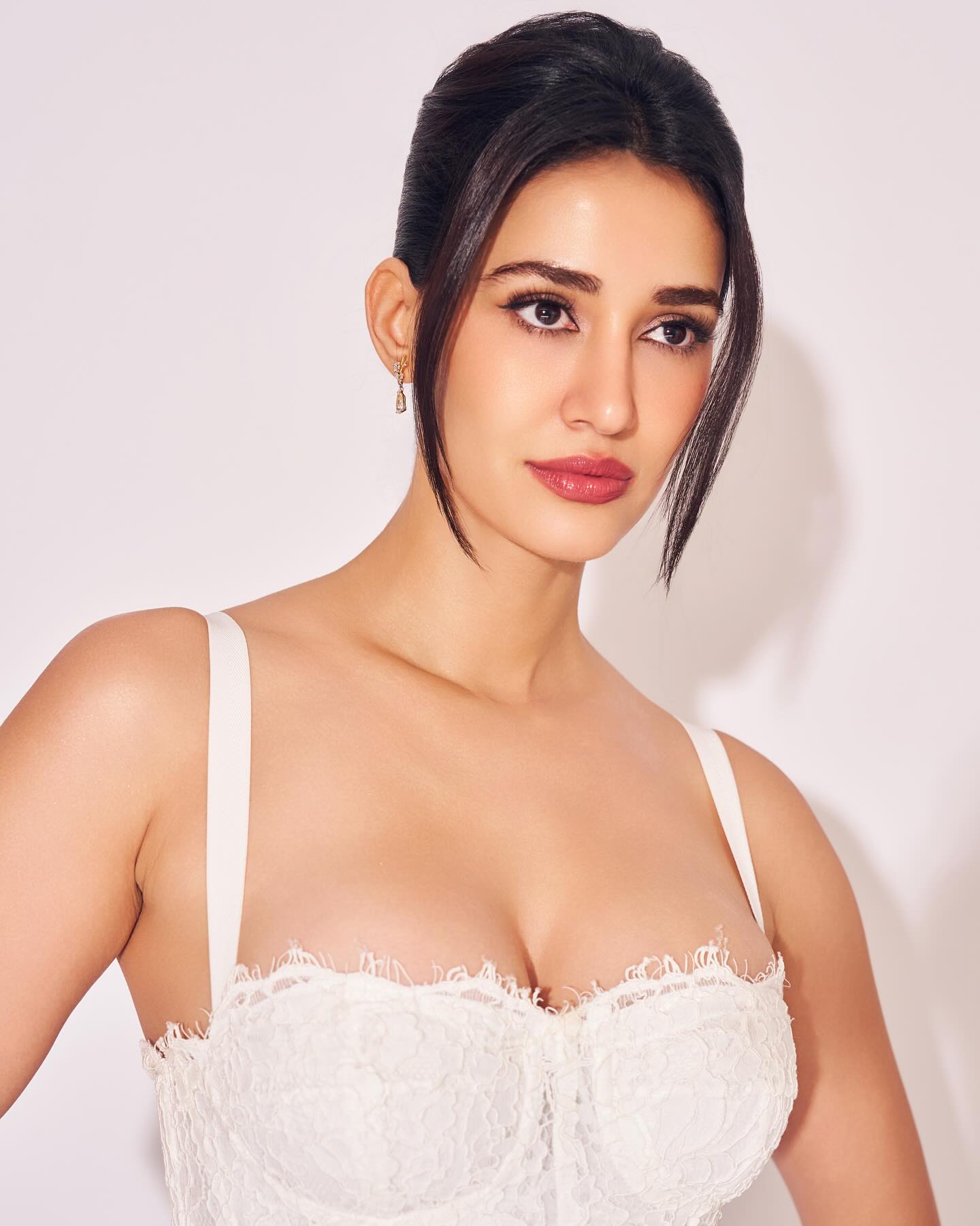 A Profile Shot Of Disha Patani In Her White Dress