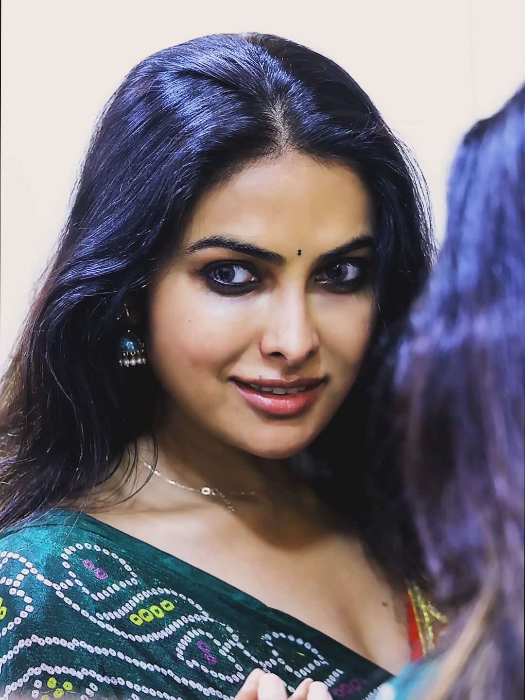 Divi Vadthya's captivating eyes and confident smile steal the show.