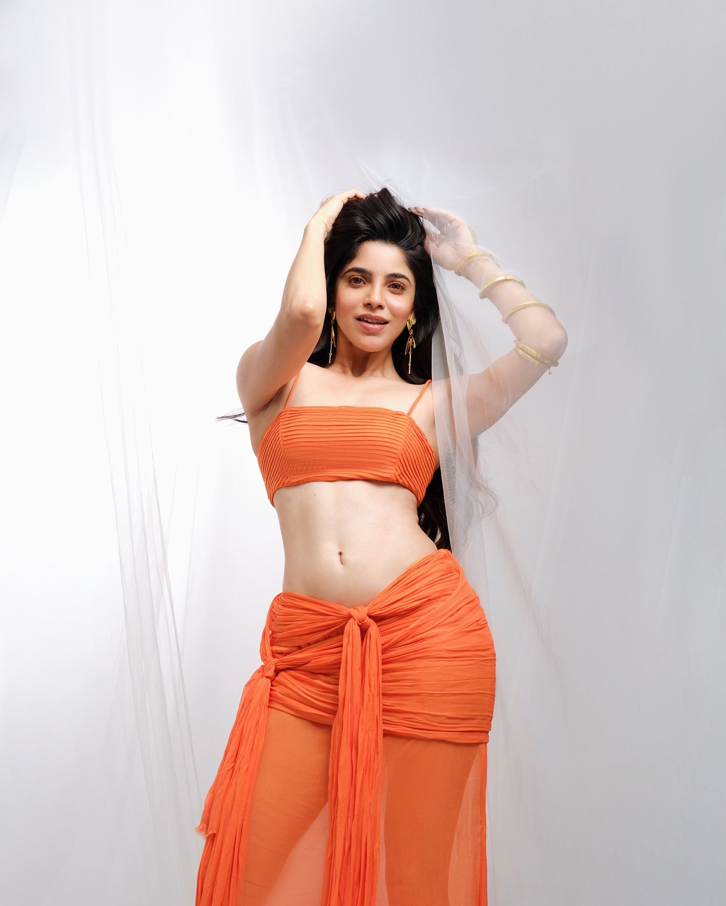 Divyabharathi Rocks Orange Outfit With Chic Glam