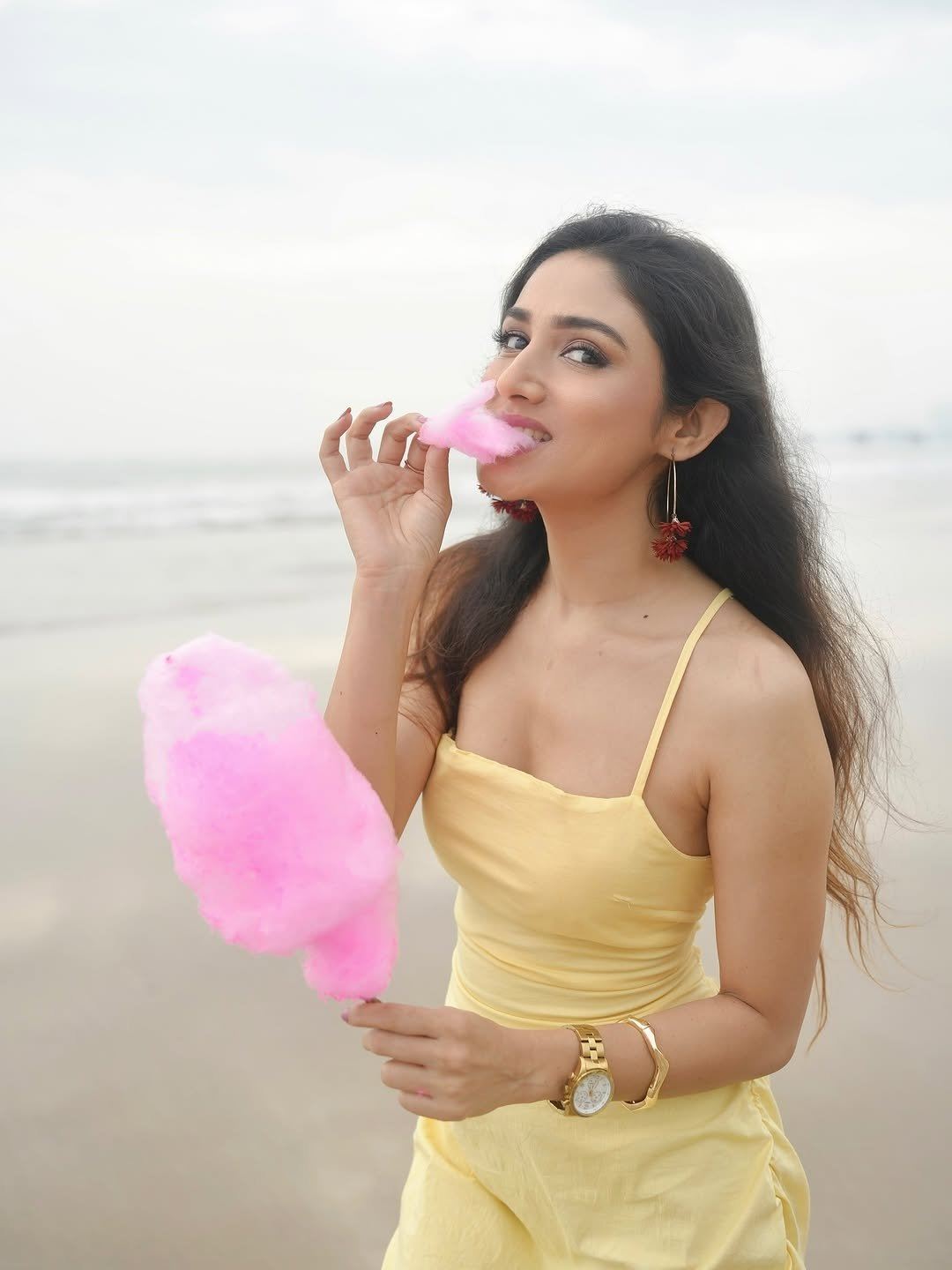 Beautiful Donal Bisht enjoying beach vibes with cotton candy
