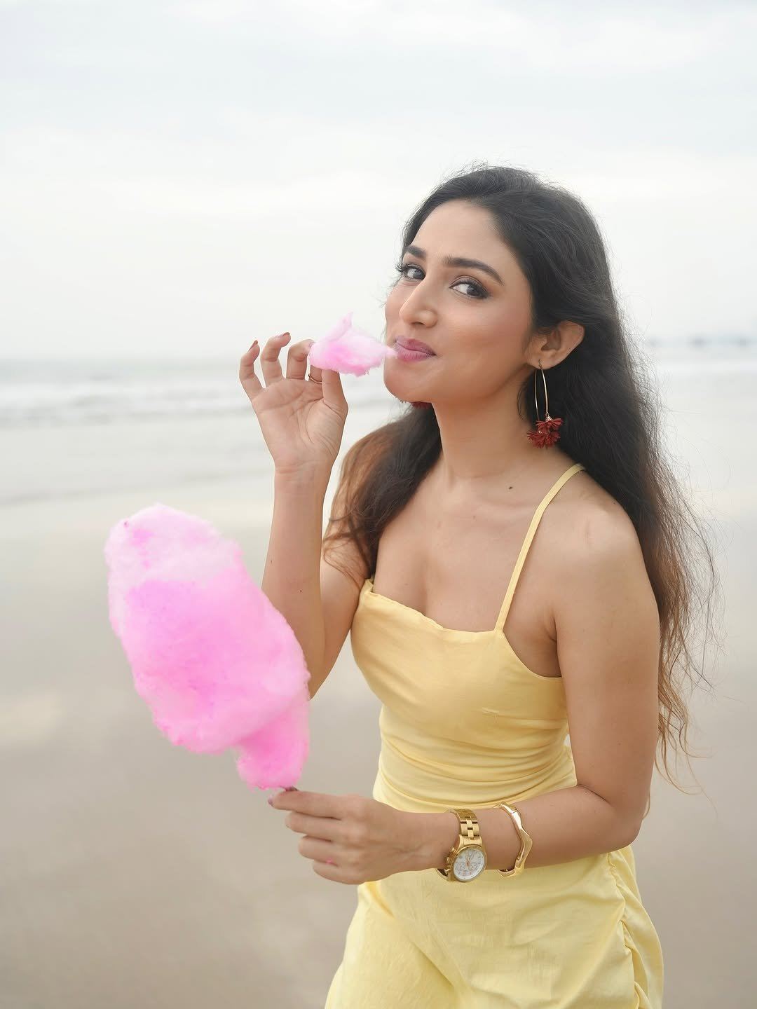 Donal Bisht glowing in beachside pictures wearing stylish yellow dress