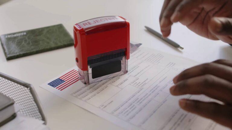Immigration form with denied stamp
