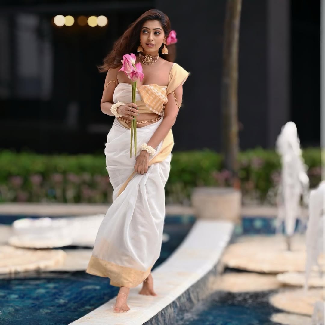 Gorgeous Kuhasini hot photoshoot picture with radiant expression.