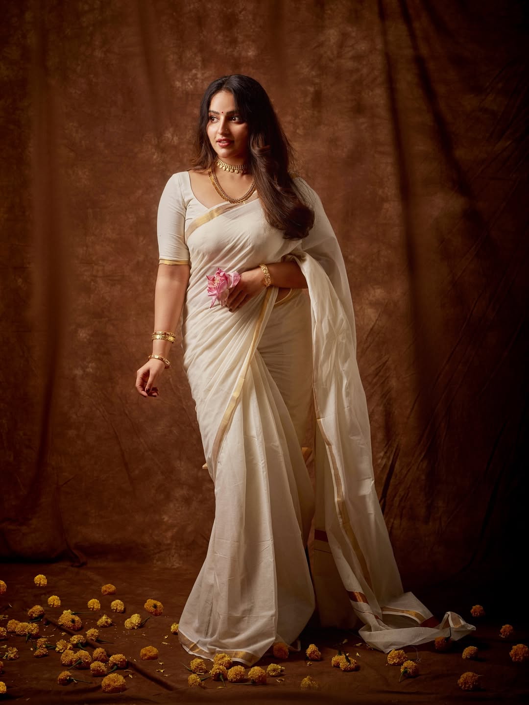 Graceful Onam festive look carried elegantly by Malavika Menon.