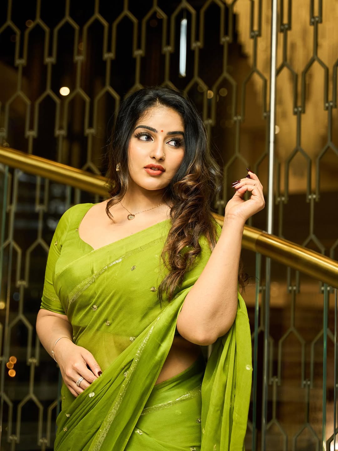 Stunning Malavika Menon saree hotness shines with bold confidence.
