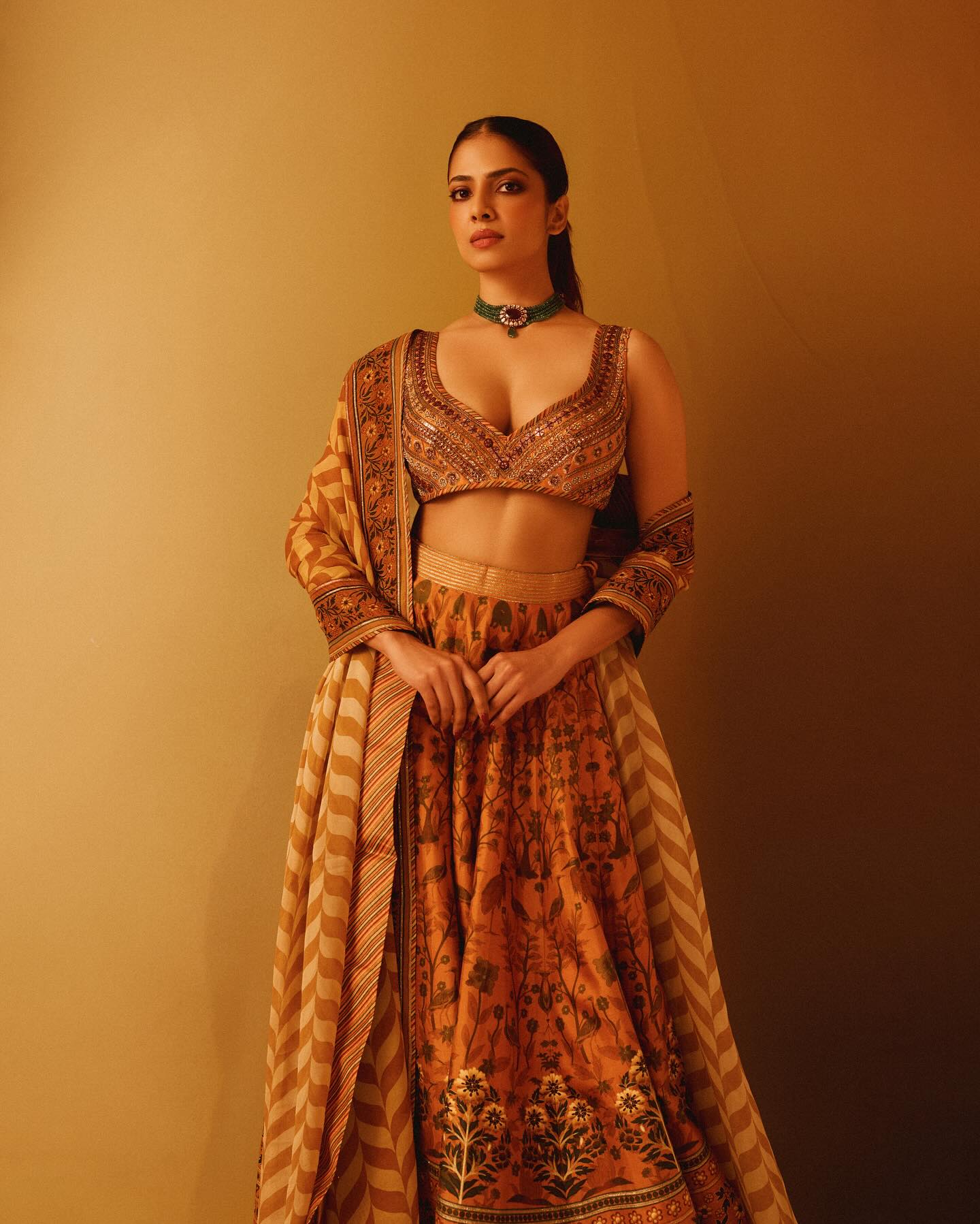 Malavika Mohanan Flaunts Curves In Lehenga Look