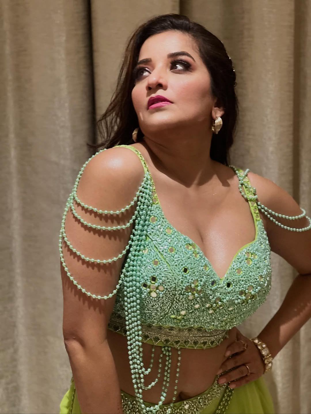 Monalisa Strikes A Sultry Pose In A Lime Green Top