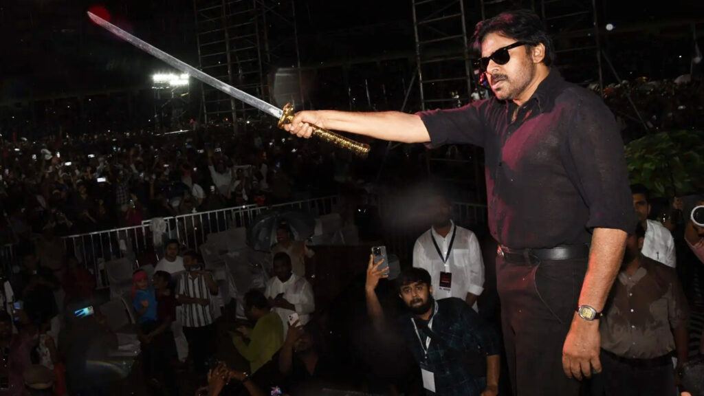 Pawan Kalyan fans watching OG movie trailer at event