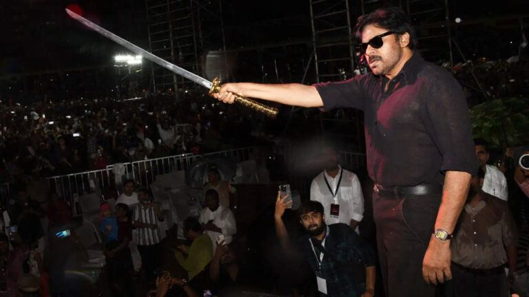 Pawan Kalyan fans watching OG movie trailer at event