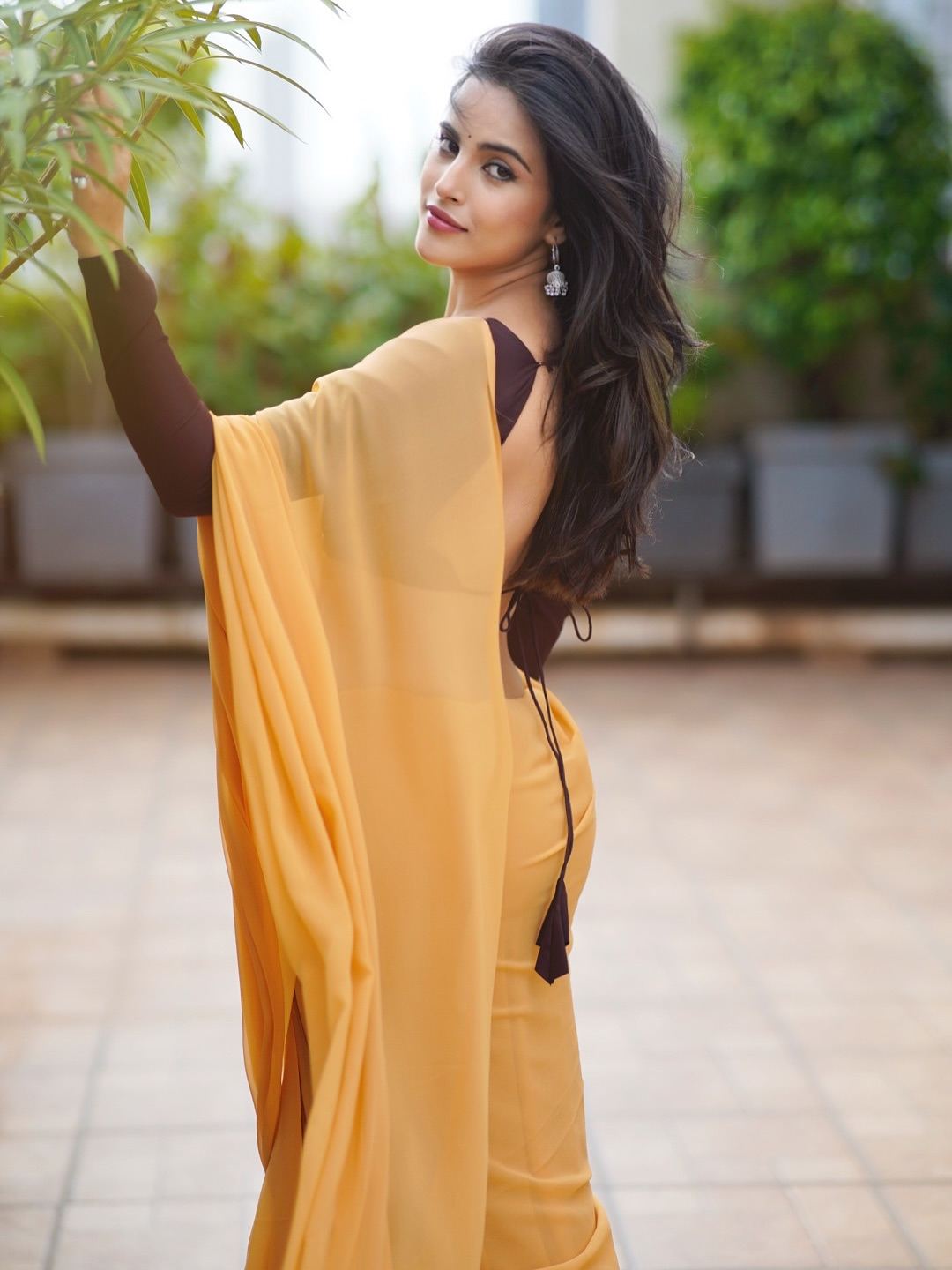 The Actress Draped In A Sheer Mustard Saree