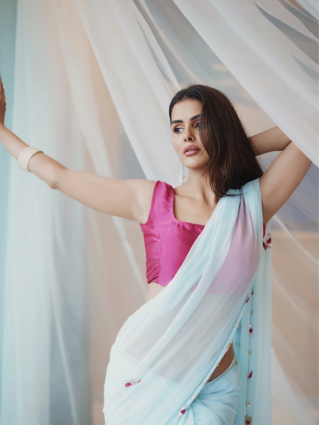 Priyanka Chahar's Striking Pink Sleeveless Blouse