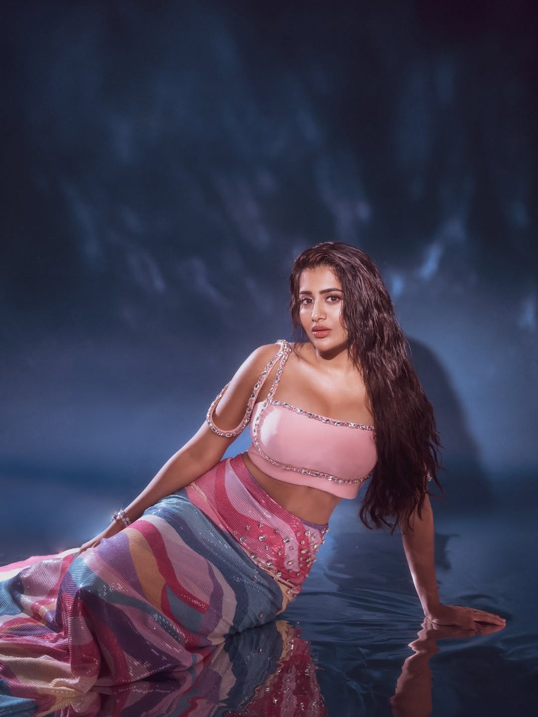 Rashi Singh in a serene profile pose highlighting her jeweled outfit.