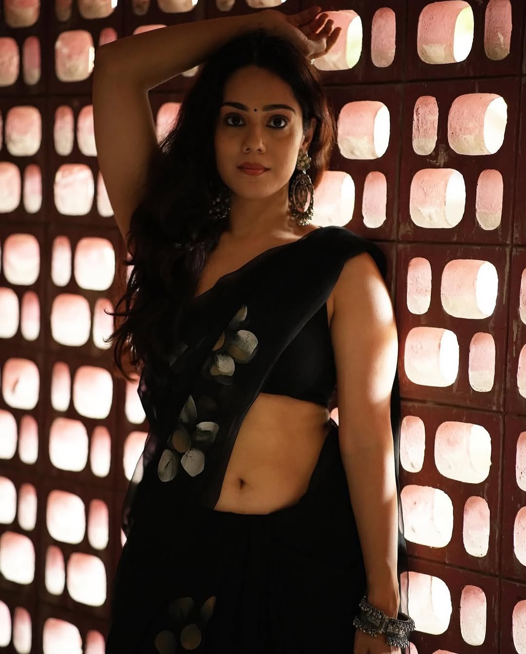 The actress rocks a modern ethnic look with a strappy blouse.