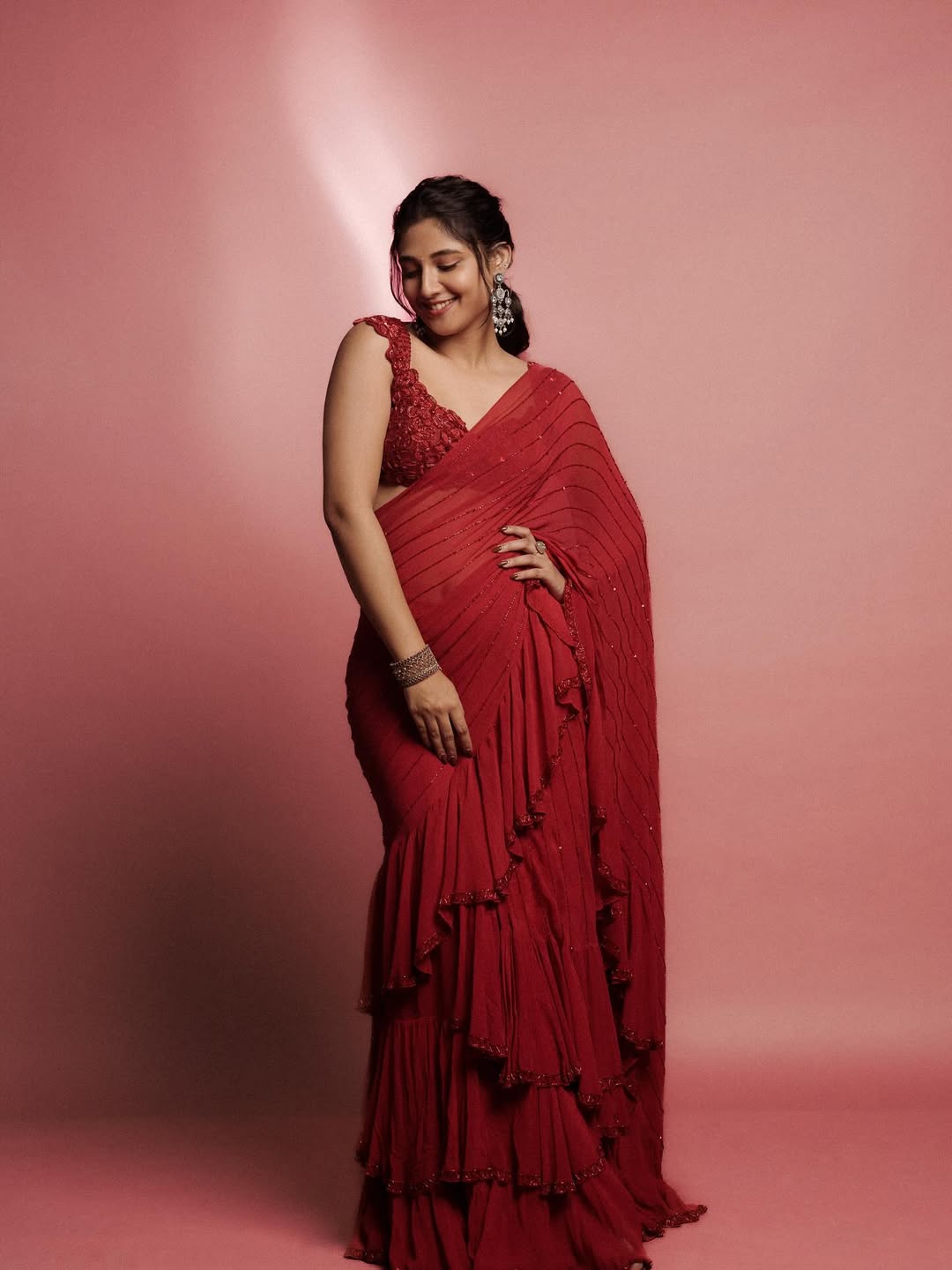 Bold and Beautiful: Ritika Nayak’s Red Saree Glam captures chic, confident vibes.