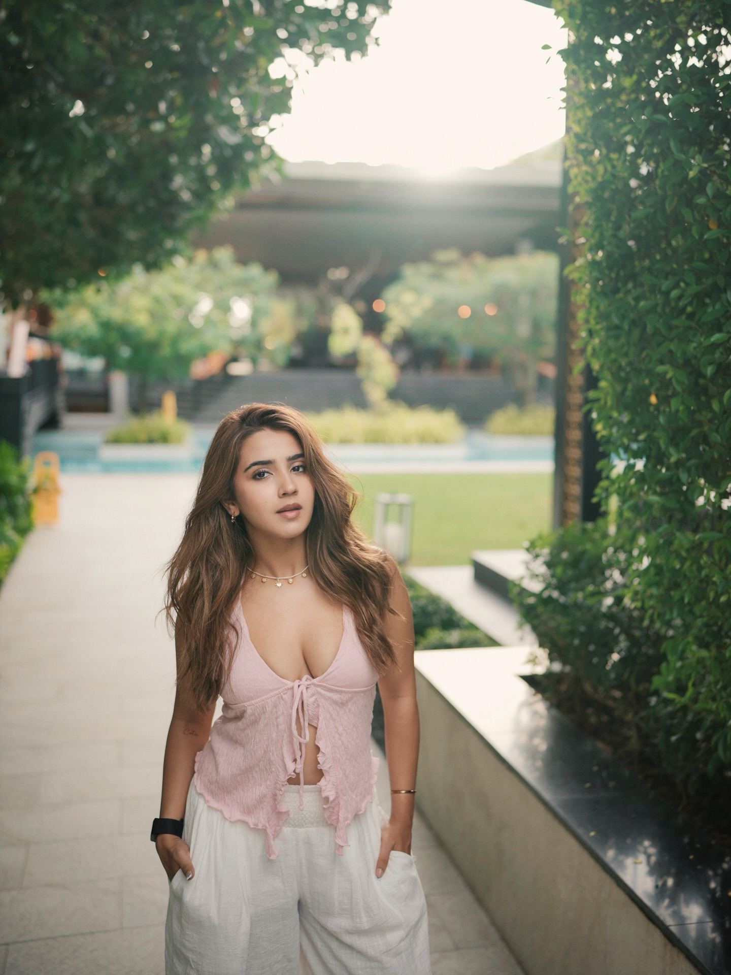 Bold Roshni Walia In Pink Top White Pants