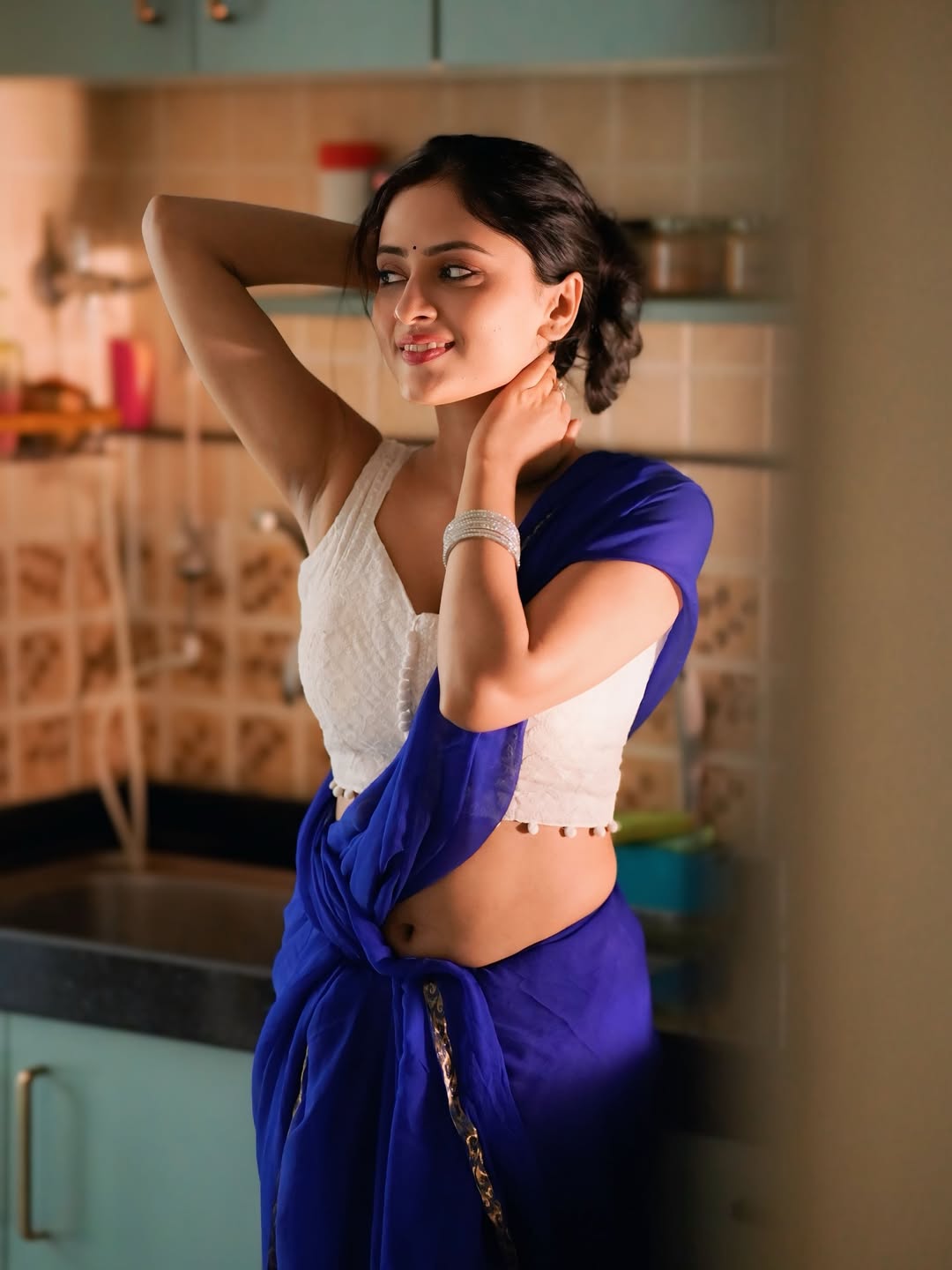 A beautiful side profile of Sanya Thakur enjoying her morning coffee.