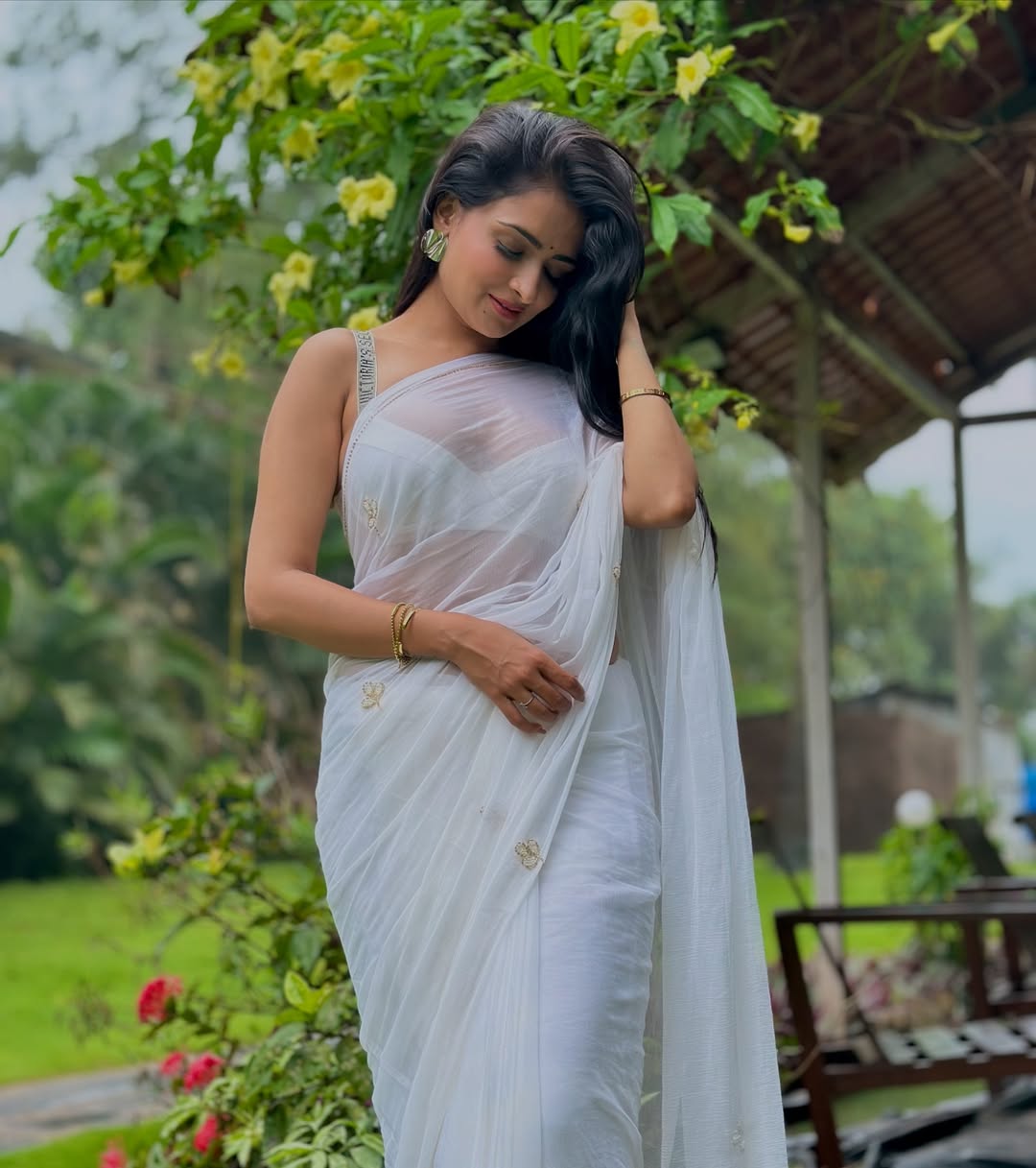 Urvashi Apsara exudes glamour and beauty in White Saree Magic.