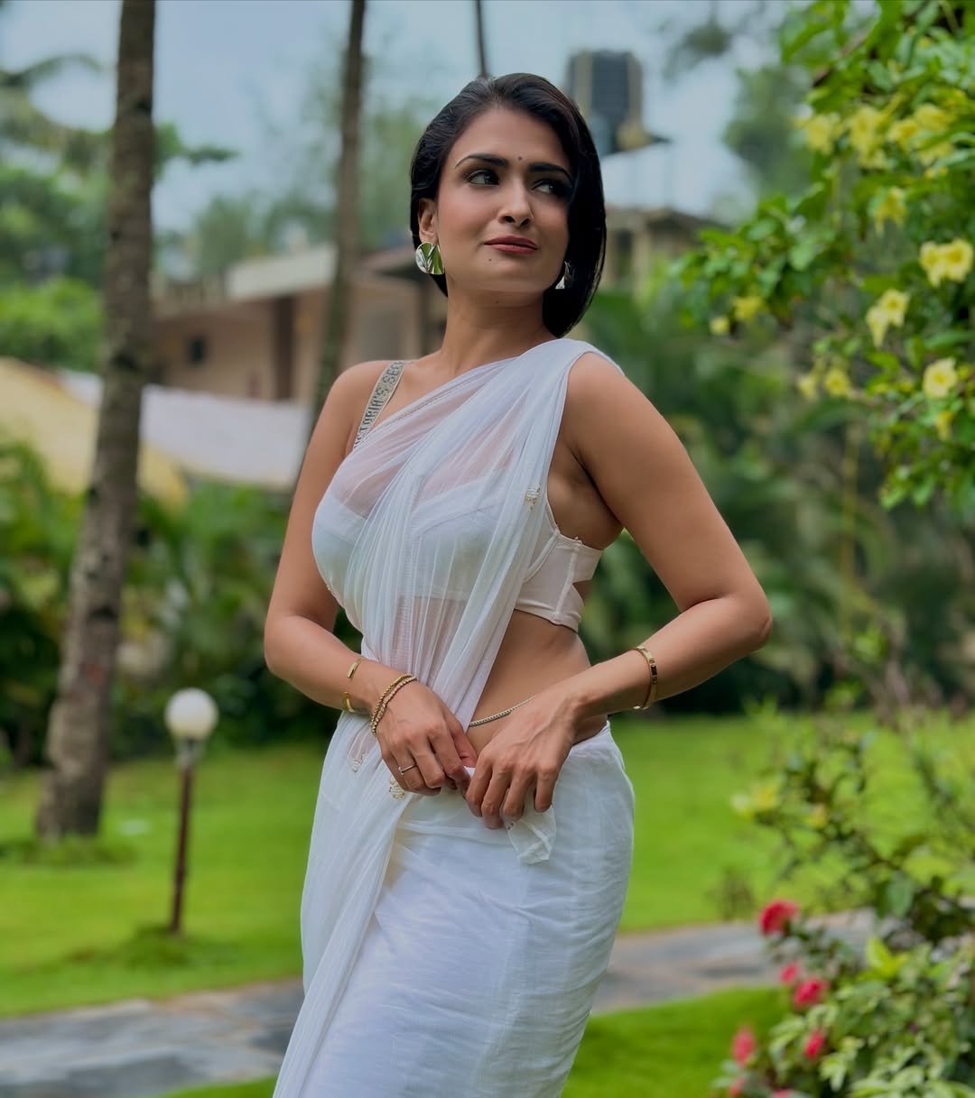 White Saree Magic by Urvashi Apsara highlights classic style and grace.