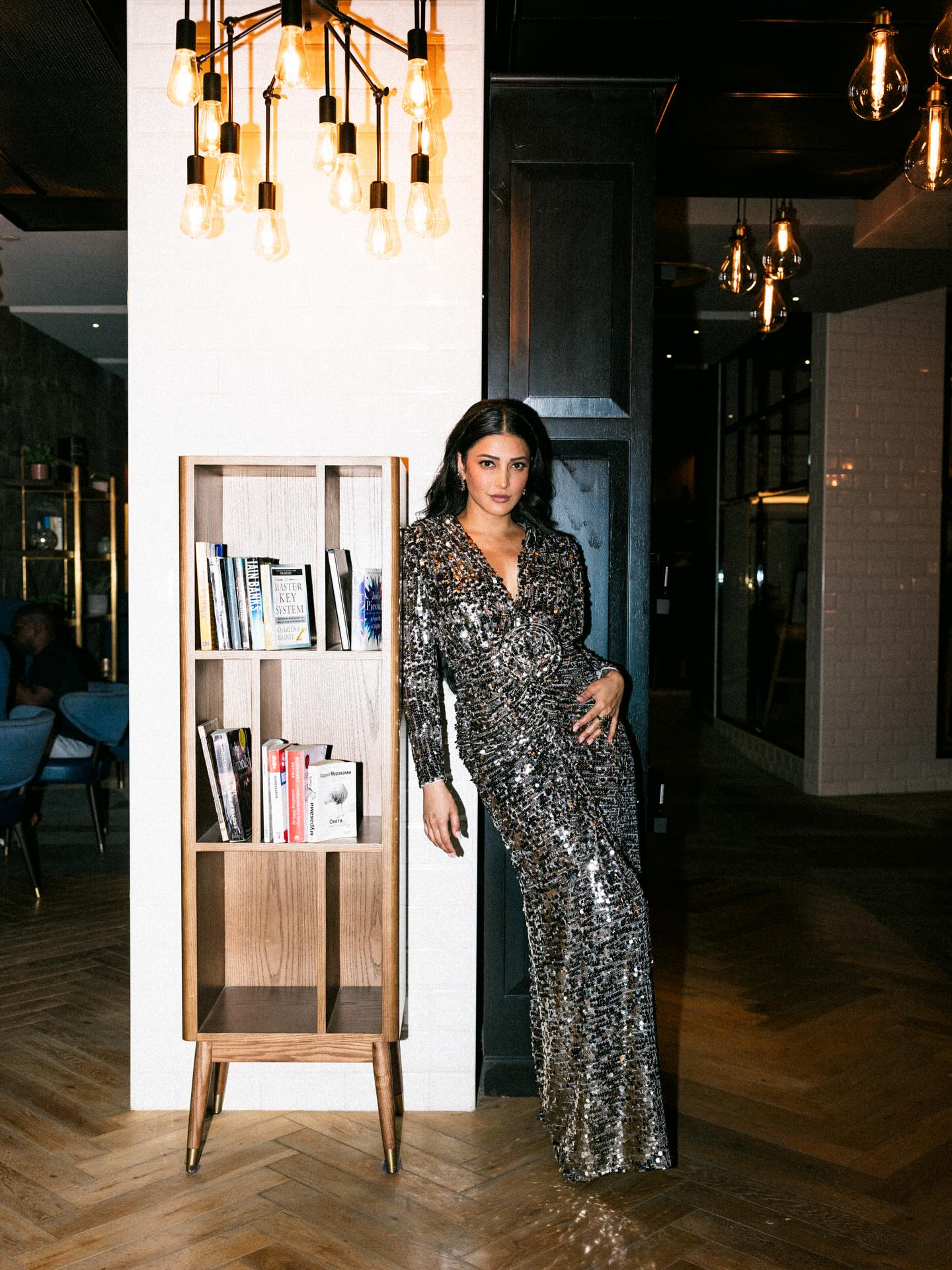 Shruti Haasan flaunts her rock-chic style in a sparkly V-neck dress.