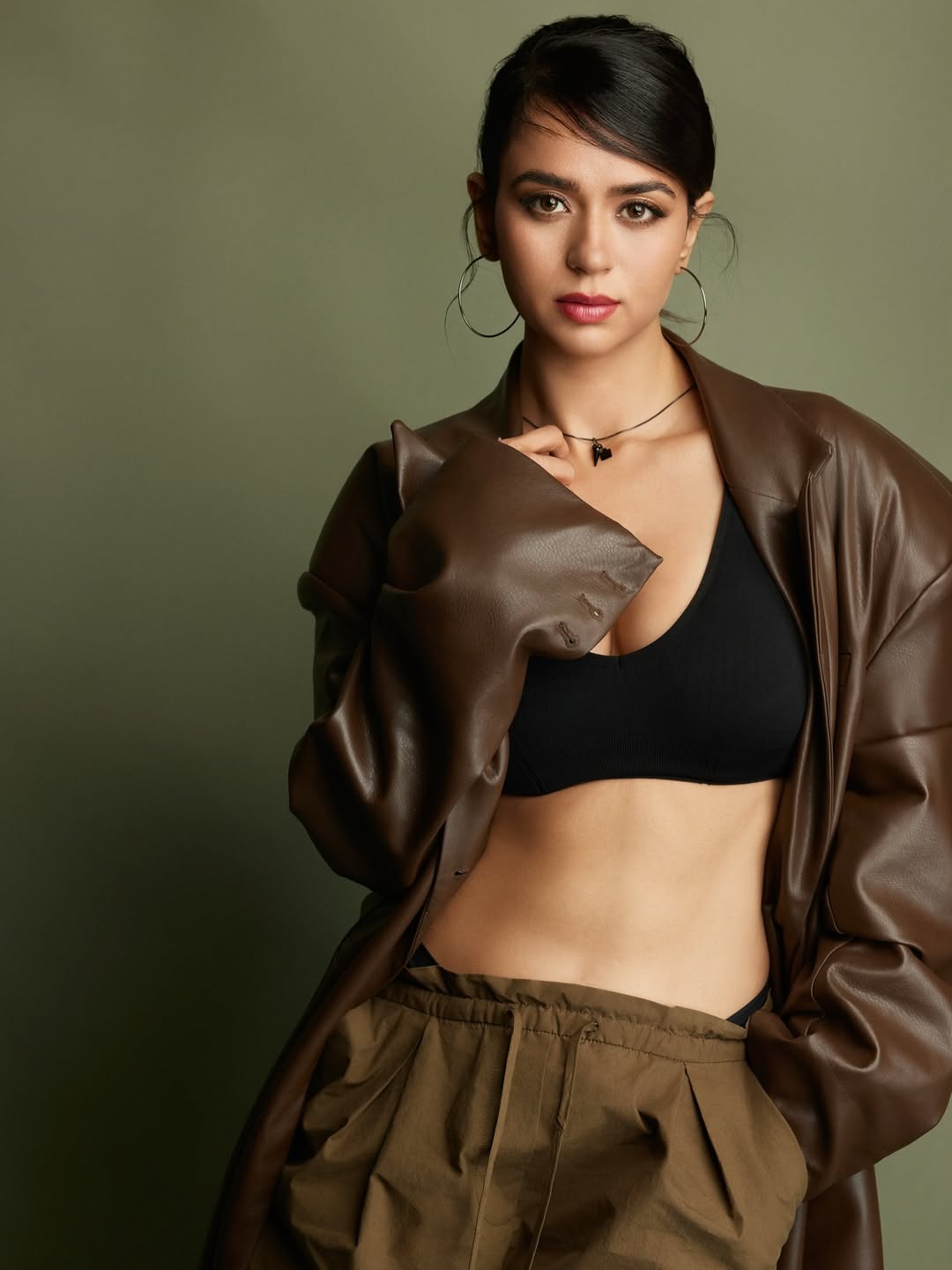 The Actress Rocks A Brown Leather And Black Top Look