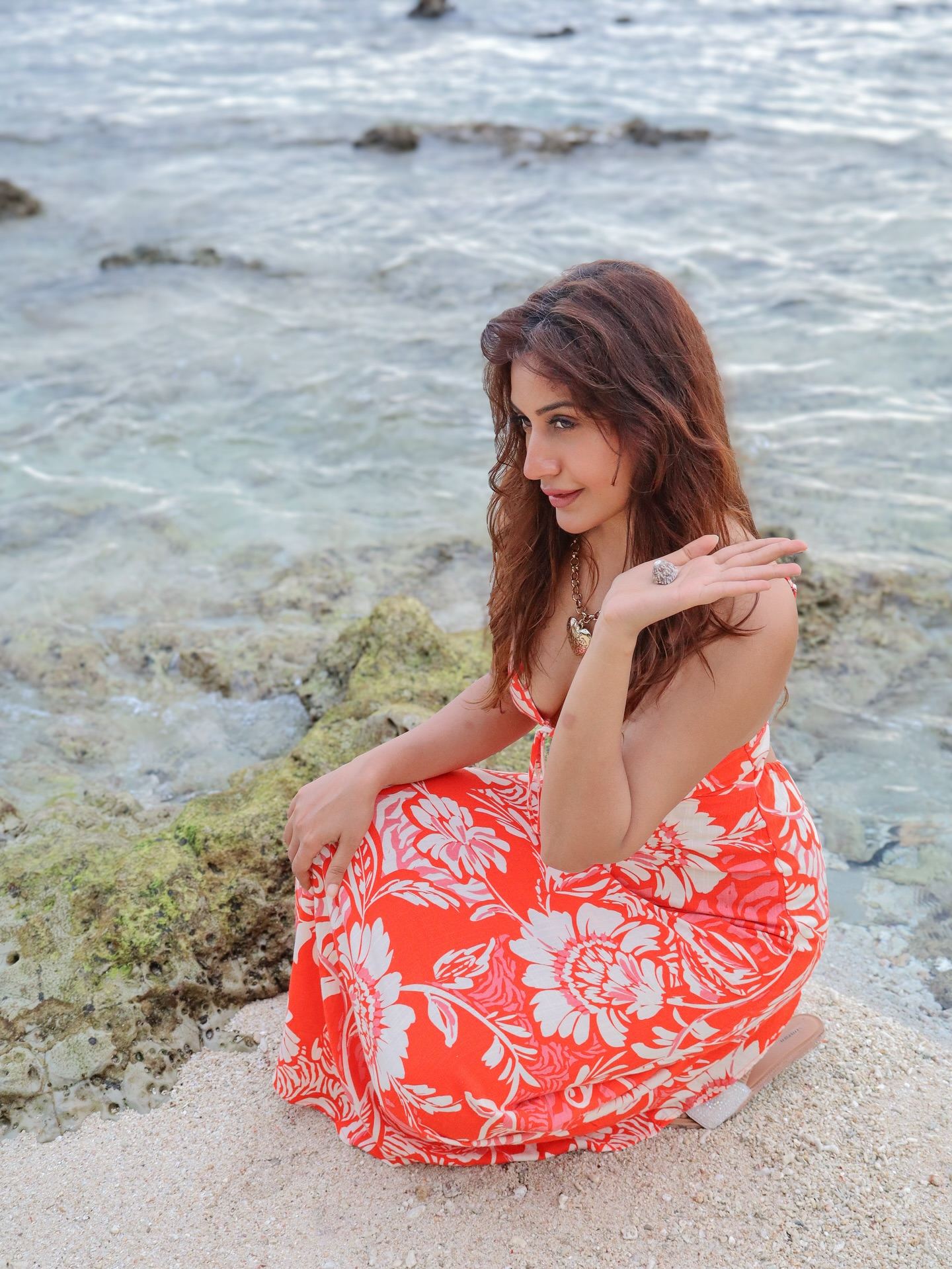 Surbhi Chandna flaunting her curves on the sand.